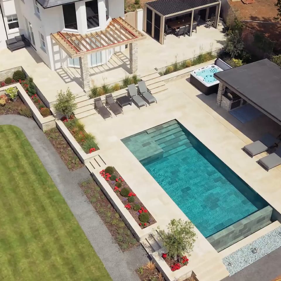 Overhead view of the pool, lawn and pergola at Nateley Scures